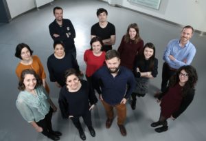 The Cahová group in 2019, photographed from above with everyone looking up at the camera