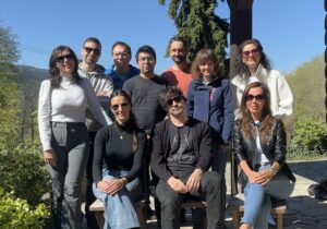 The Cahová Group standing together outdoors during the 2026 lab retreat in the Šumava Mountains